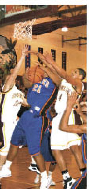 Hornets and Lancers battle under the boards.