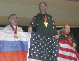 Alan Bown earned gold at the arm wrestling world championships.