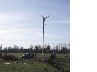 Josh Hulburt installed a wind turbine on his Enumclaw acreage. An 8-mph breeze can generate power for his home.