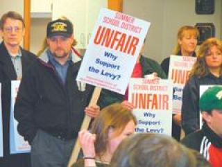 Union members protest contract, question levy