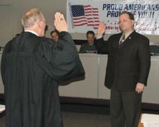 Johnson, judge and council members take oath of office
