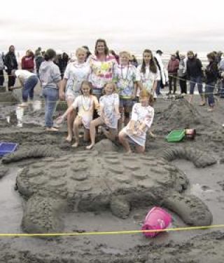 Sand angels show off their stuff in sand castle contest