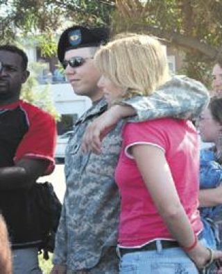 Soldier receives escort and thanks for service