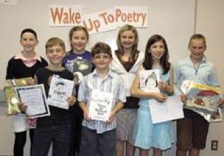 Students honored by the Friends of the Buckley Library for their poetry were: front row