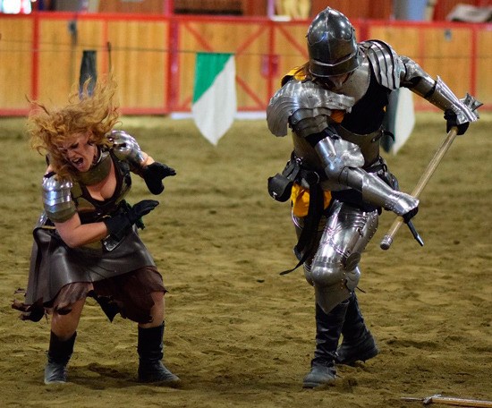 Two Seattle Knights mock-fighting.