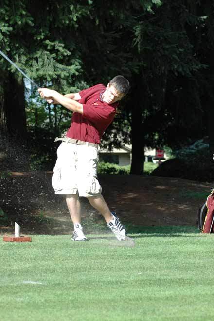 White River's Trevor Lubking tees off during competition with Enumclaw at Tapps Island.