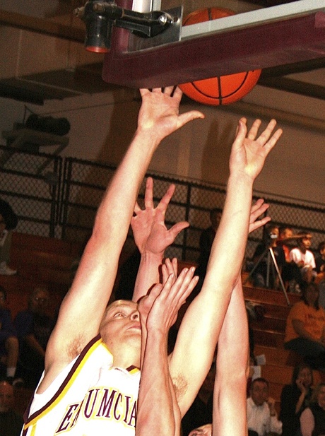 Enumclaw's Anthony Goch goes inside for a rebound against Sumner.