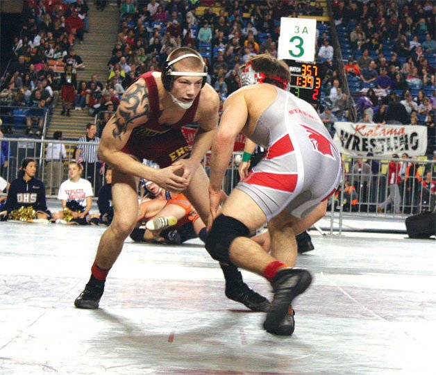 Justin Mitchell took fourth in the 152-pound weight class at the Mat Classic state wrestling tournament at the Tacoma Dome Saturday.