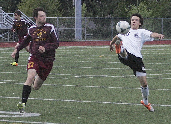Bonney Lake senior Brody Fitzsimmons concentrates on maintaining possession of the ball during the final regualr season game Wednesday. The Panthers beat the Enumclaw Hornets 4-0.