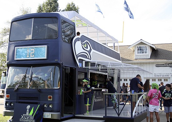 'The Beast' made its debut Thursday before the final preseason game to family and friends of the group of Seahawk fans who owns this double-decker tailgating bus.