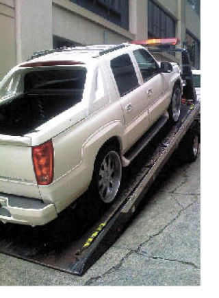 Enumclaw police seized this Cadillac Escalade as part of a drug arrest.