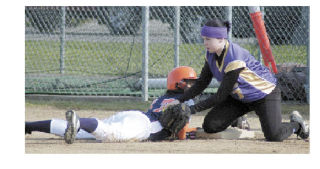 Sadie Baines’ tag is late as the Lakes runner returns to first base during the Spartans’ 11-2 victory at home last week.