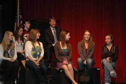 Student Lauren Redman talks about life at Enumclaw High with fellow students and Superintendent Mike Nelson.