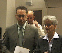 Malcolm Fraser with defense Attorney Ann Carey after entering a not guilty plea in April 2012. Fraser was convicted on all counts May 29.