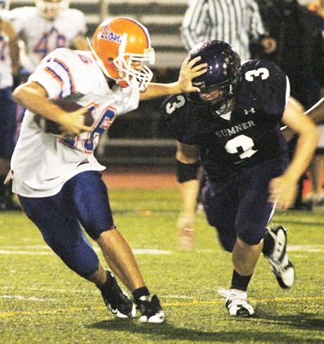 An Auburn Mountainview player is chased by Sumner's Cody Haavik during the fourth quarter of the Spartans' homecoming win Oct. 16.