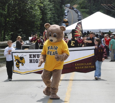 The King County Fair Bear and the Enumclaw High marching band walked across the Green River Gorge Bridge during reopening ceremonies today.