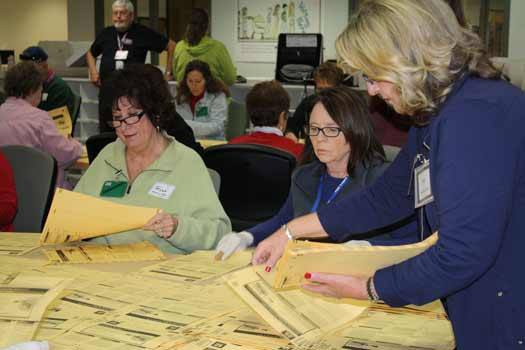 Pierce County elections workers sort ballots Dec. 6 as part of the Fiore District 22 recount.