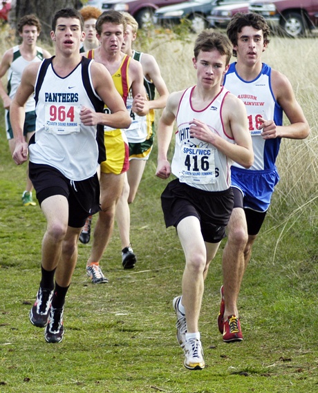 White River's Cody Gould is challenged by Bonney Lake's Brandon Baumchen and others during the SPSL/WCC Cross Country Subdistrict Meet Oct. 24 at Fort Steilacoom in Lakewood.