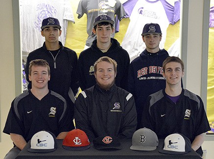 Sumner seniors prepare to play ball at college next year. Front row