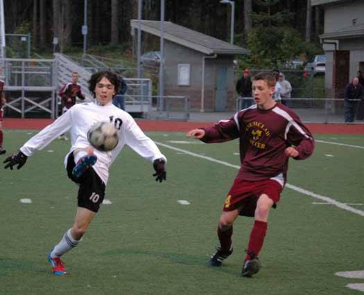 Brody Fitzsimmons fights for ball control during the Panthers 1-0 victory over Enumclaw April 4.