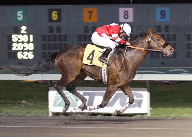 Malibu Rum and Debbie Hoonan scored by 3-1/2 length Friday in the Johnsonville Purse at Emerald Downs. April 20