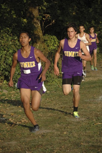 Arturo Perez and Jordan Landes chug away on the slow and winding Orting course.