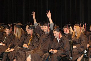 Casey Azeltine celebrates Collins High School graduation June 5