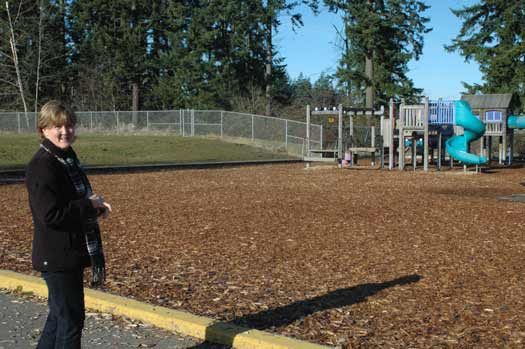 Lake Tapps Elementary School Principal Connie GeRoy stands in front of the school's playground
