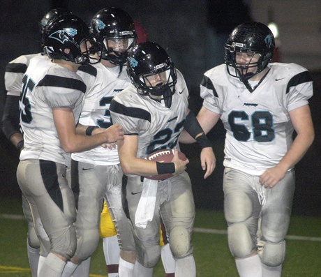 Colton Nash is congratulated by teammates after scoring his second touchdown against O'Dea.