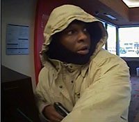 The suspect pictured is suspected of committing a series of bank robberies the first on January 16