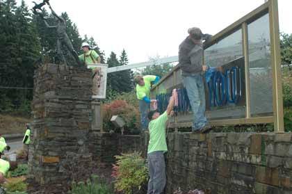 Volunteers work to clean up Ascent Park during Beautify Bonney Lake