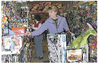 Sumner school staff member Kileen Synder seraches for toys.