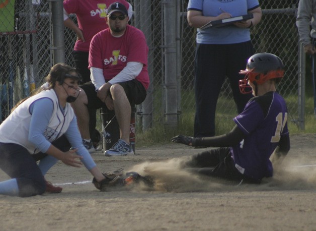 Sumner's Jessica Peterson slides into third Friday during the district tournament.