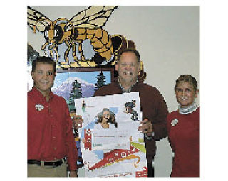 Bonney Lake Target representatives Kelli Barclay and Jon Guidoux presented White River High School Principal Mike Hagadone with a check in the amount of $229.87 recently. The donation is a result of the parents