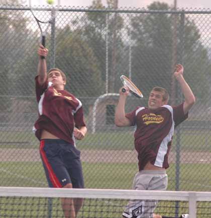 Enumclaw's Tyler McCarthy and Levi Goodin team up against Decatur Sept. 22.
