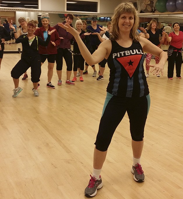 Christine Offerdahl leads another enthusiastic group through a Zumba workout.