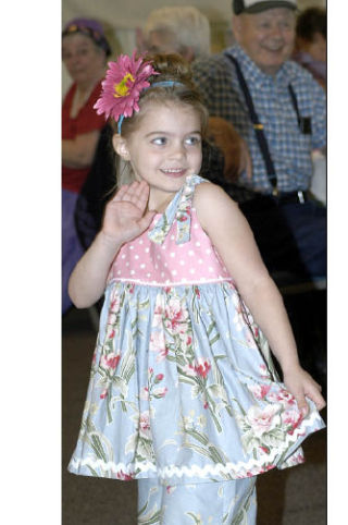 Cynthia Nelson models an outfit during a Spring Fashion Show at the Bonney Lake Senior Center Friday.