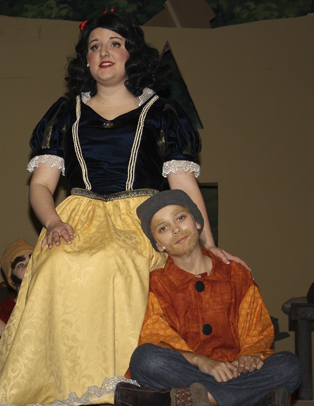 Snow White played by Kayli HIggins rehearses Friday with Summer Mays who was filling in as an understudy for the dwarf Dippy in ManeStage Theatre Company’s production of Snow White.