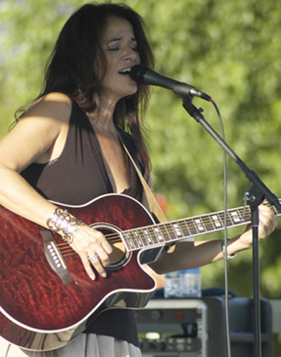 Kellee Bradley sings to a crowd of more than 200 people at Heritage Park in Sumner July 10 as part of the Music Off Main concert series.