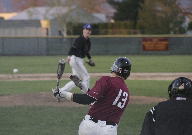 Tyler Carlson hits a ball for Enumclaw in a losing effort to Auburn Mountainview Friday at Osborne Field.