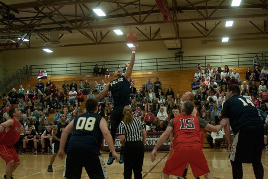 The Boots and Badges charity basketball game played through it's fifth year with the police Lawdogs and the Enumclaw Fire Department Smoke Eaters