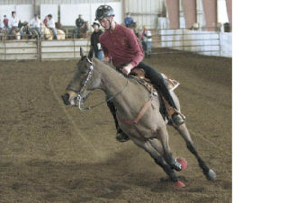 Kyle Elliott competes in the team bi-wrangle event for Enumclaw High School. In its second year of participation