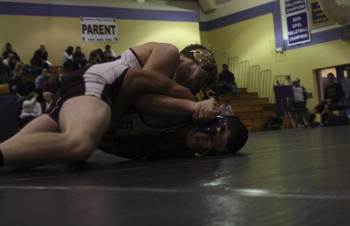 White River's Caleb Mooresethna traps Bob Richards against the mat with an ironclad half nelson. Richards didn't fall to a pin