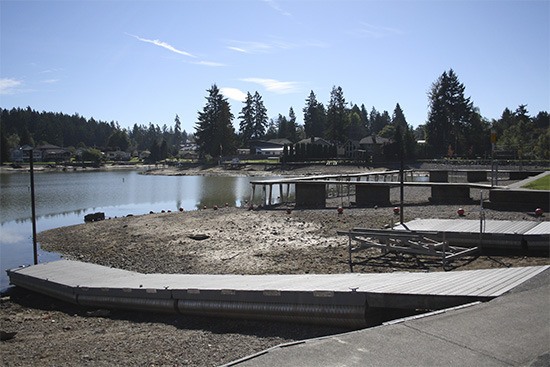 The swimming and boat dock area of Lake Tapps drained of water.