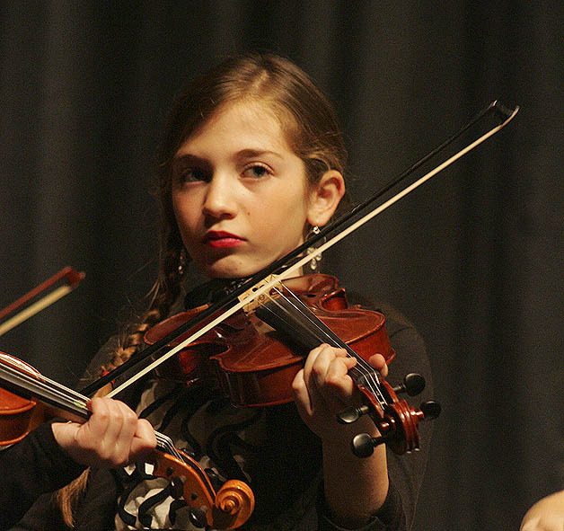 Kayden Wells performs March 29 at the Magic Strings Concert at the Enumclaw High School auditorium.