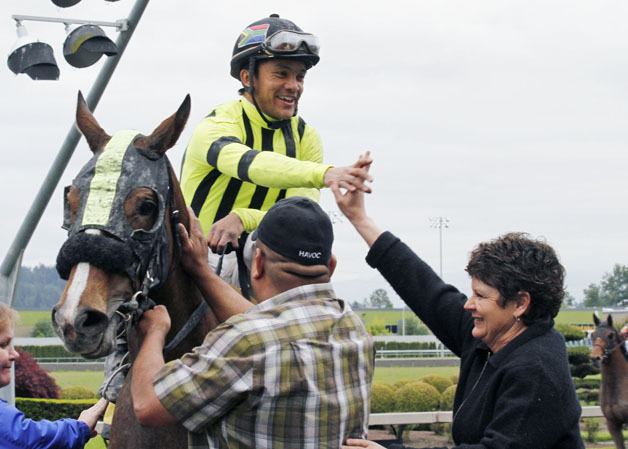 Jockey Leslie Mawing has found a way to balance his family life while working in a demanding sport of thoroughbred horse racing.
