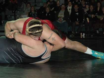 Colten Malek was part of the Enumclaw High wrestling team's three-pin run that helped the No. 1-ranked Hornets defeat No. 2 Bonney Lake in the South Puget Sound League 3A season opener Dec. 7.