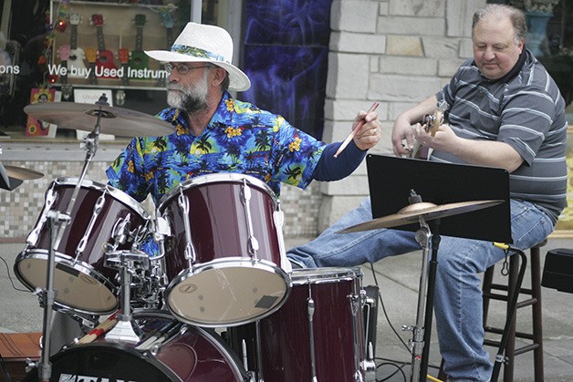 A band was in front of Enumclaw Music and artisans were out on Cole Street Saturday during the Chamber of Commerce Spring Wine Walk.