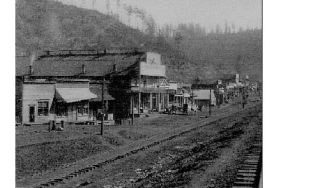 This undated photograph shows downtown Wilkeson in days long past. The storefronts are on Church Street