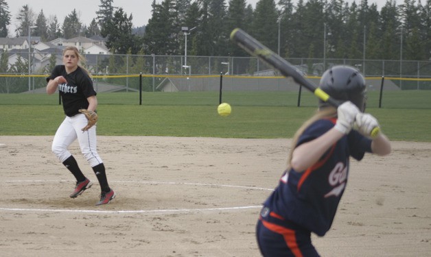 Melissa Charron tosses out a pitch in Wednesday's game. She struck out nine Decatur players.